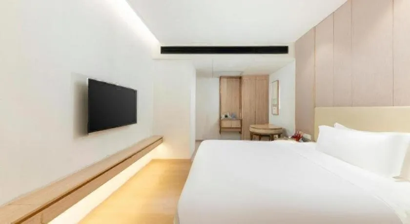 Bed in GreenTree Eastern Hotel Shenzhen Nanshan District Qianhai Free Trade Zone Lilin Metro Station