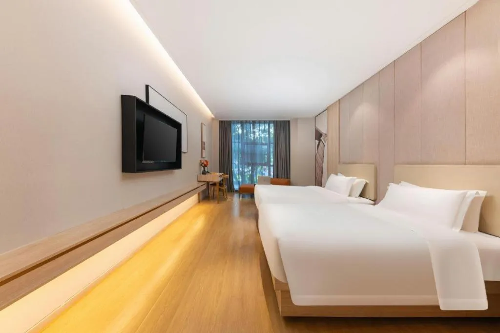 Bed in GreenTree Eastern Hotel Shenzhen Nanshan District Qianhai Free Trade Zone Lilin Metro Station