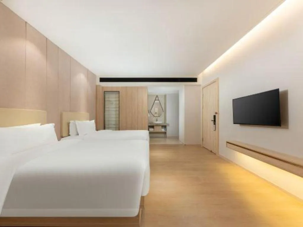 Bed in GreenTree Eastern Hotel Shenzhen Nanshan District Qianhai Free Trade Zone Lilin Metro Station