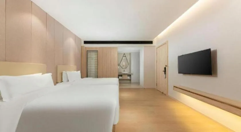 Bed in GreenTree Eastern Hotel Shenzhen Nanshan District Qianhai Free Trade Zone Lilin Metro Station