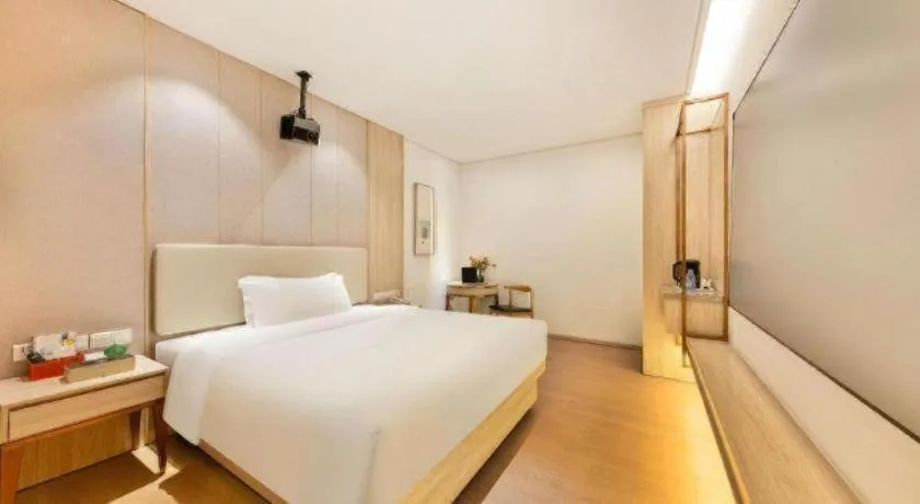 Bed in GreenTree Eastern Hotel Shenzhen Nanshan District Qianhai Free Trade Zone Lilin Metro Station