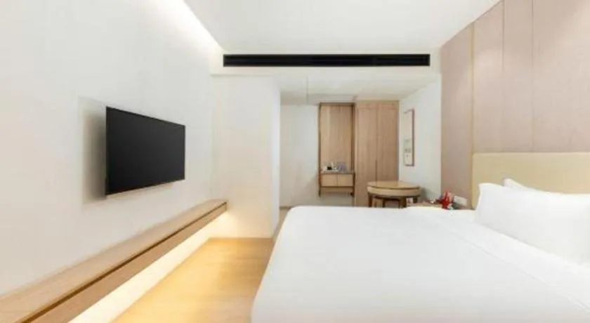 Bed in GreenTree Eastern Hotel Shenzhen Nanshan District Qianhai Free Trade Zone Lilin Metro Station