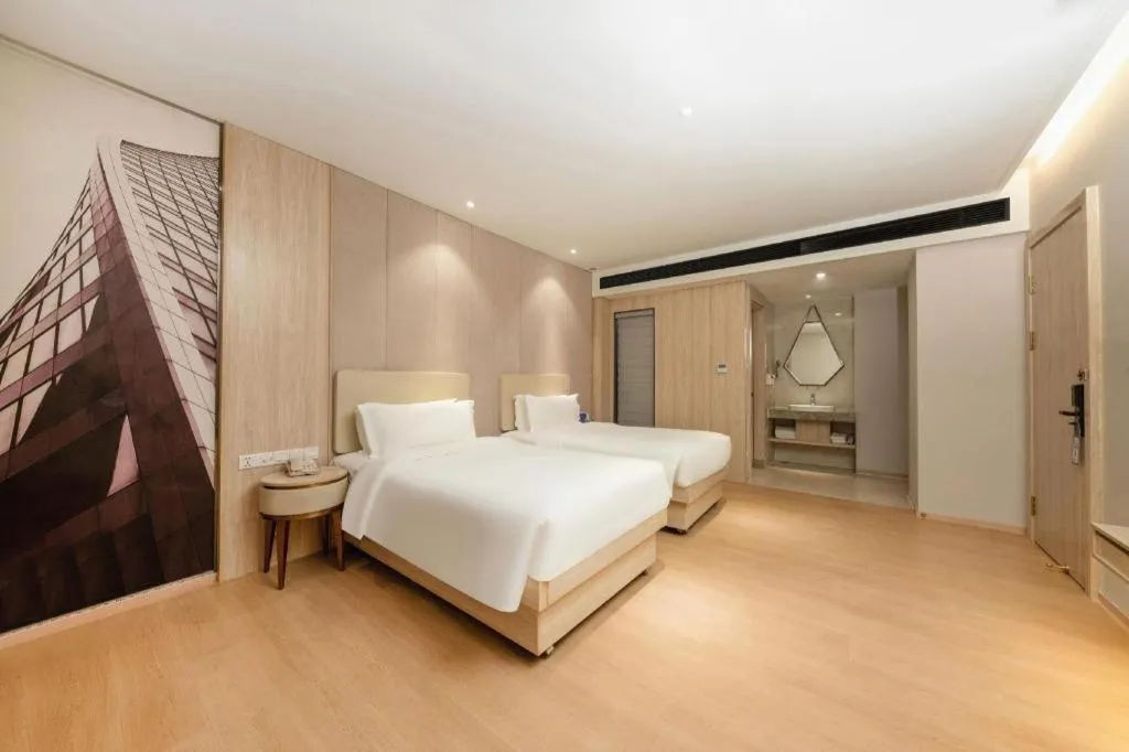 Bed in GreenTree Eastern Hotel Shenzhen Nanshan District Qianhai Free Trade Zone Lilin Metro Station