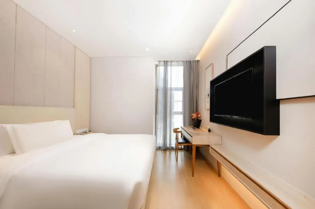 Bed in GreenTree Eastern Hotel Shenzhen Nanshan District Qianhai Free Trade Zone Lilin Metro Station