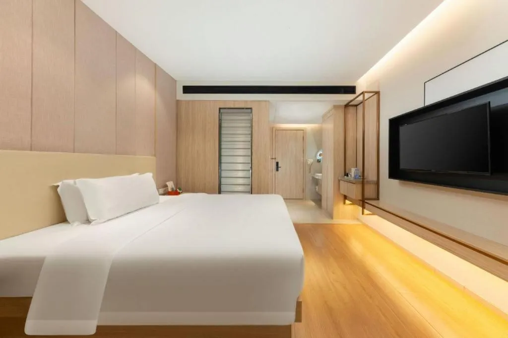 Bed in GreenTree Eastern Hotel Shenzhen Nanshan District Qianhai Free Trade Zone Lilin Metro Station