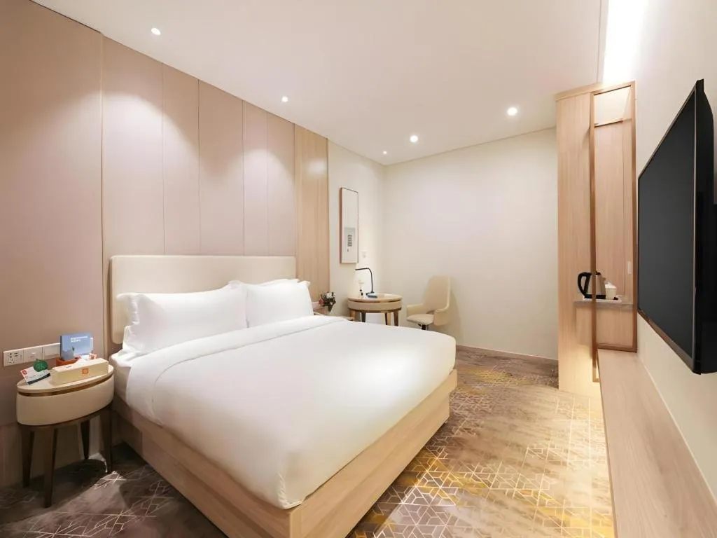 Bed in GreenTree Eastern Hotel Shenzhen Nanshan District Qianhai Free Trade Zone Lilin Metro Station