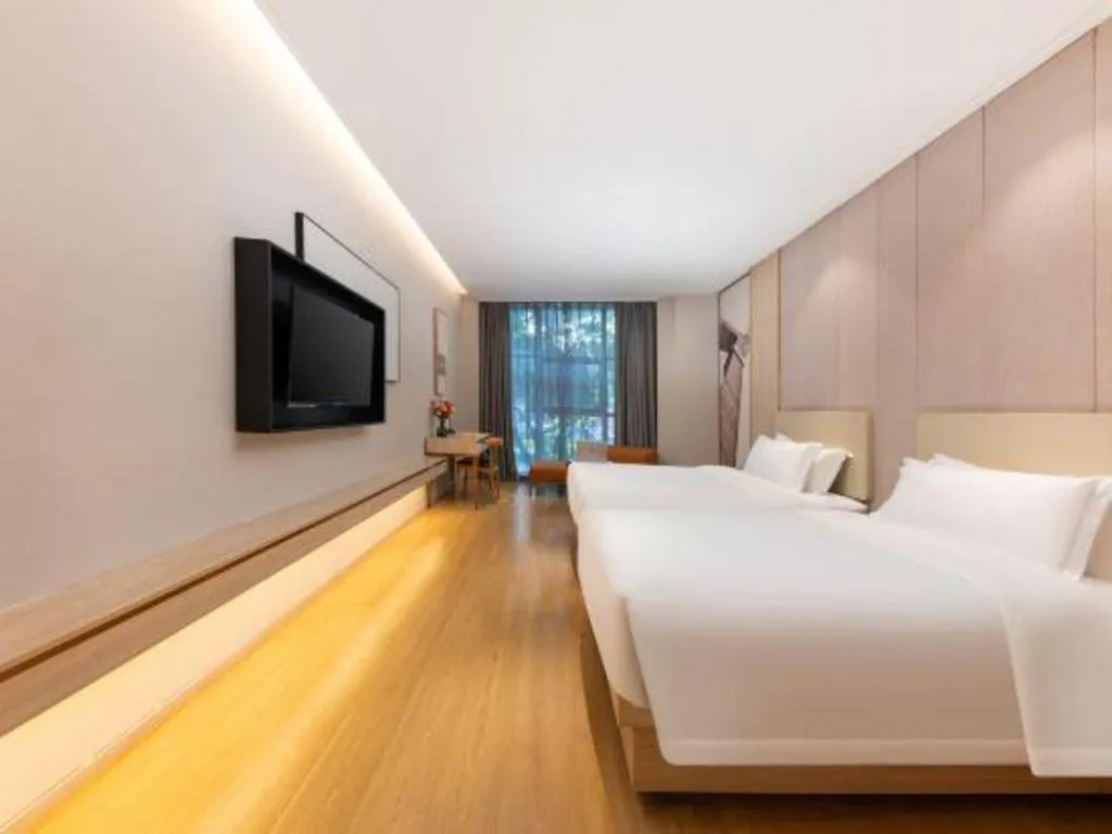 Bed in GreenTree Eastern Hotel Shenzhen Nanshan District Qianhai Free Trade Zone Lilin Metro Station