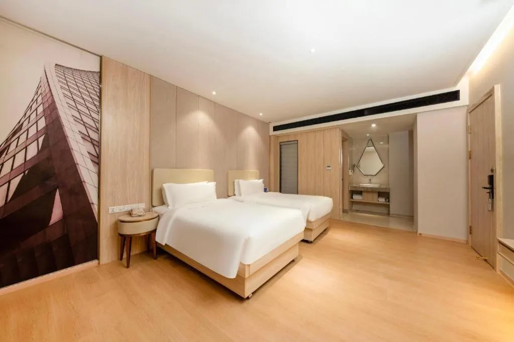 Bed in GreenTree Eastern Hotel Shenzhen Nanshan District Qianhai Free Trade Zone Lilin Metro Station