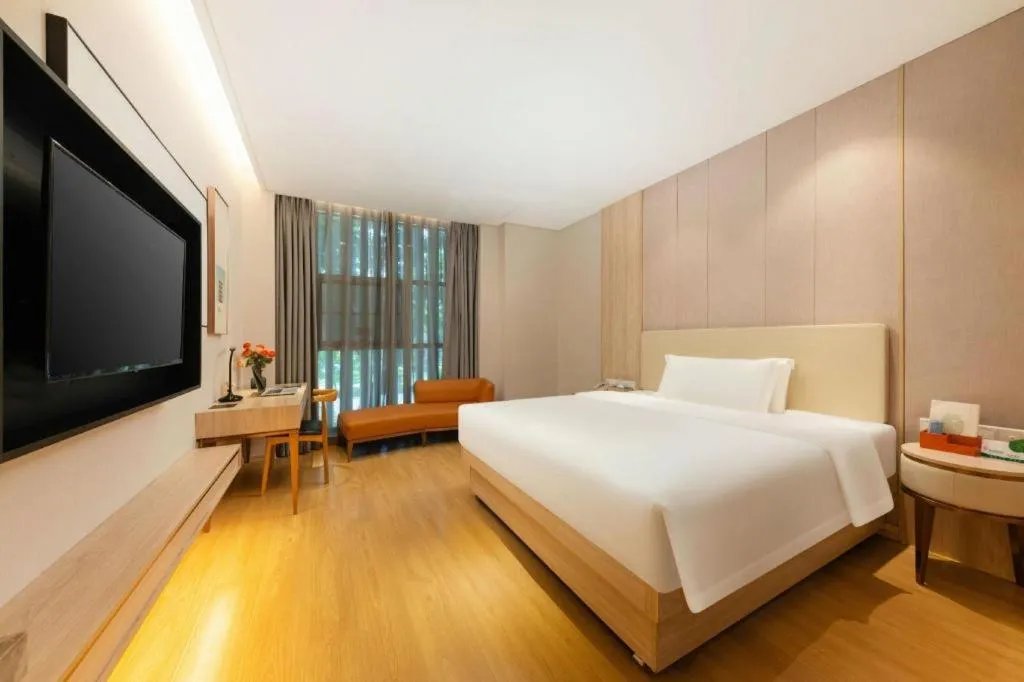 Bed in GreenTree Eastern Hotel Shenzhen Nanshan District Qianhai Free Trade Zone Lilin Metro Station