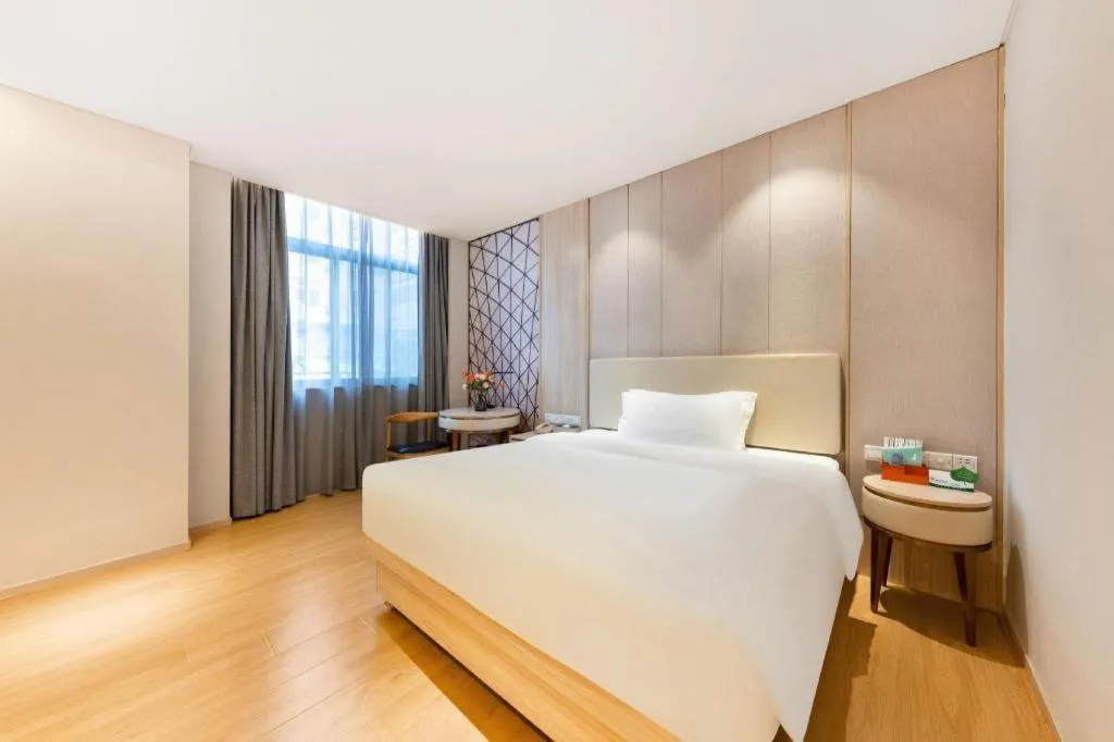 Bed in GreenTree Eastern Hotel Shenzhen Nanshan District Qianhai Free Trade Zone Lilin Metro Station