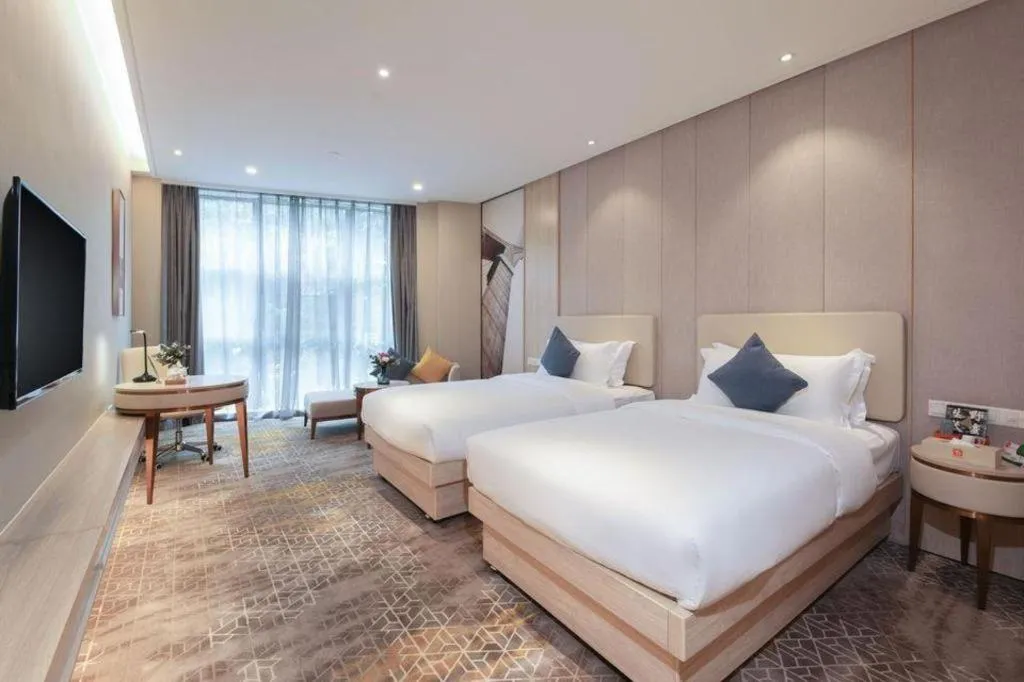 Bed in GreenTree Eastern Hotel Shenzhen Nanshan District Qianhai Free Trade Zone Lilin Metro Station