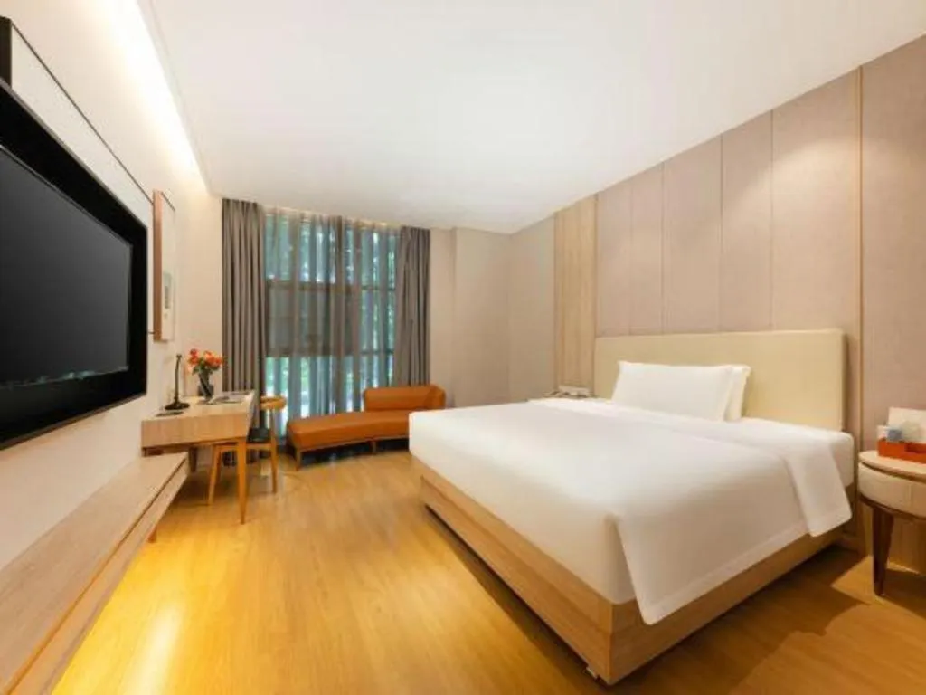 Bed in GreenTree Eastern Hotel Shenzhen Nanshan District Qianhai Free Trade Zone Lilin Metro Station