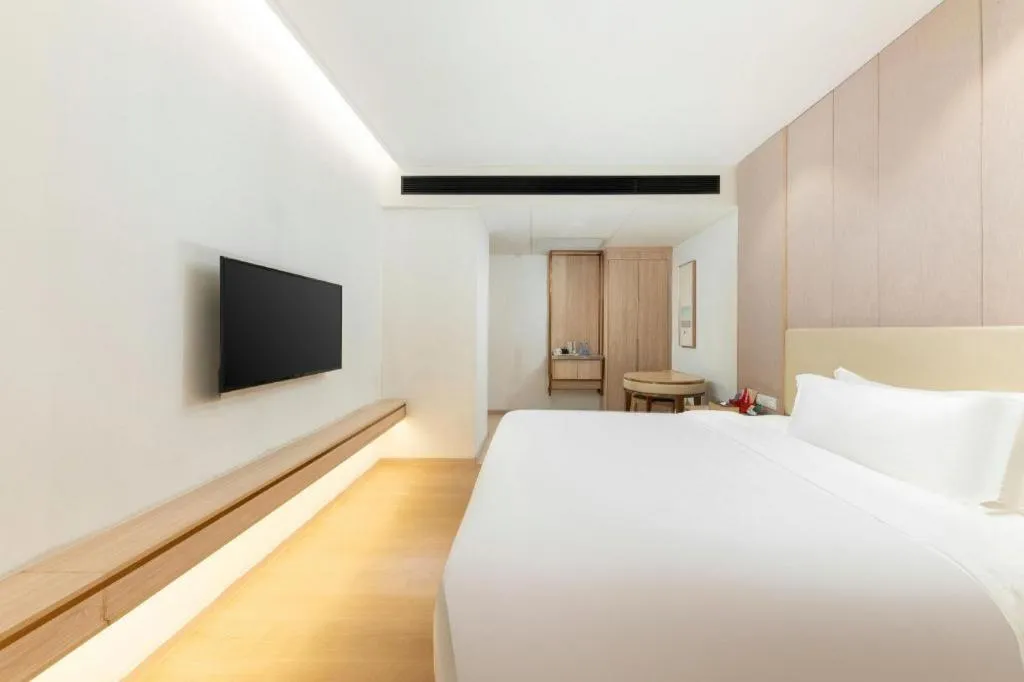 Bed in GreenTree Eastern Hotel Shenzhen Nanshan District Qianhai Free Trade Zone Lilin Metro Station