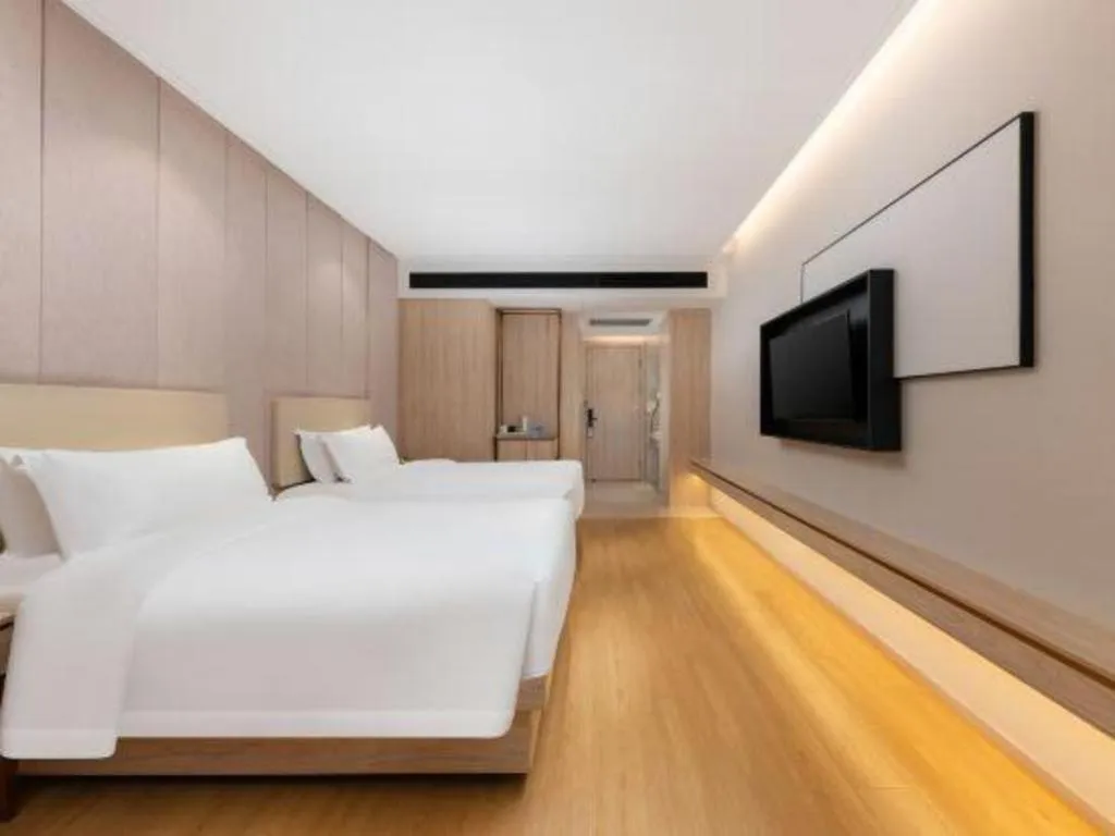 Bed in GreenTree Eastern Hotel Shenzhen Nanshan District Qianhai Free Trade Zone Lilin Metro Station