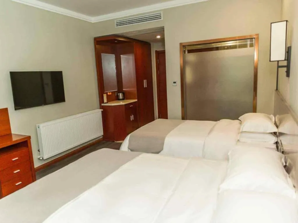 Bed in GreenTree Alliance Hotel Yancheng Engineering College Dayangwan Scenic Area