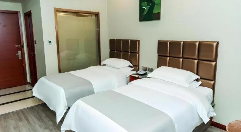Bed in GreenTree Alliance Hotel Yancheng Engineering College Dayangwan Scenic Area