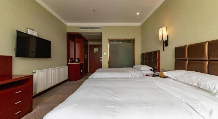 Bed in GreenTree Alliance Hotel Yancheng Engineering College Dayangwan Scenic Area