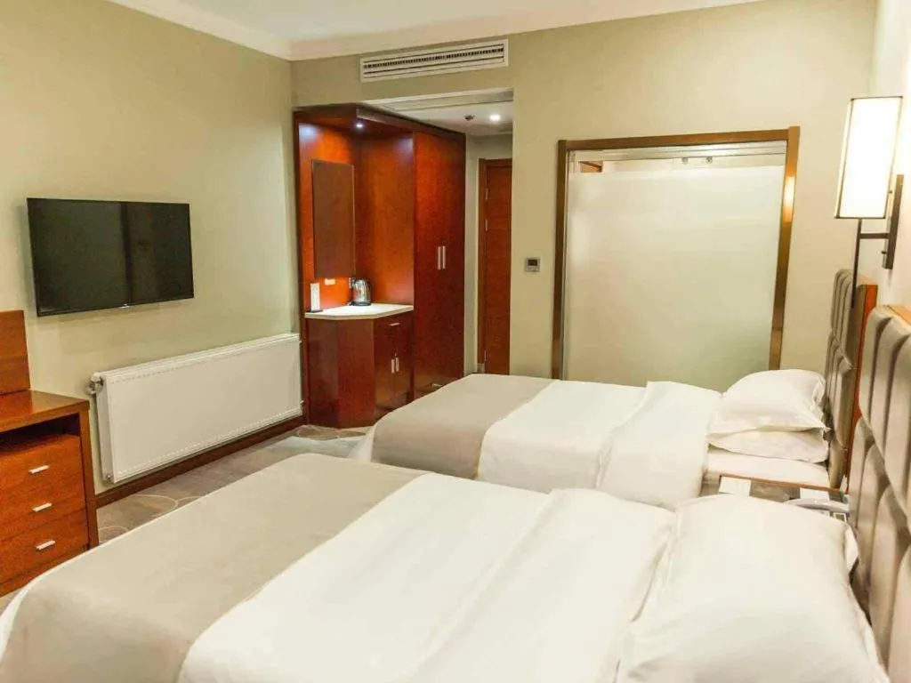 Bed in GreenTree Alliance Hotel Yancheng Engineering College Dayangwan Scenic Area