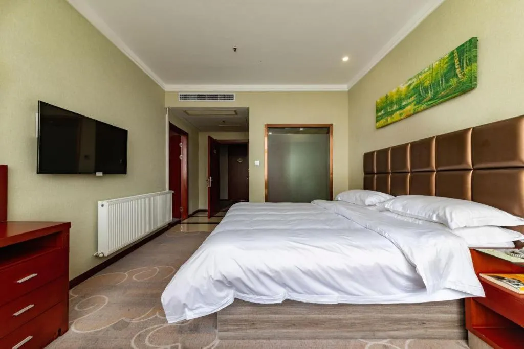 Bed in GreenTree Alliance Hotel Yancheng Engineering College Dayangwan Scenic Area