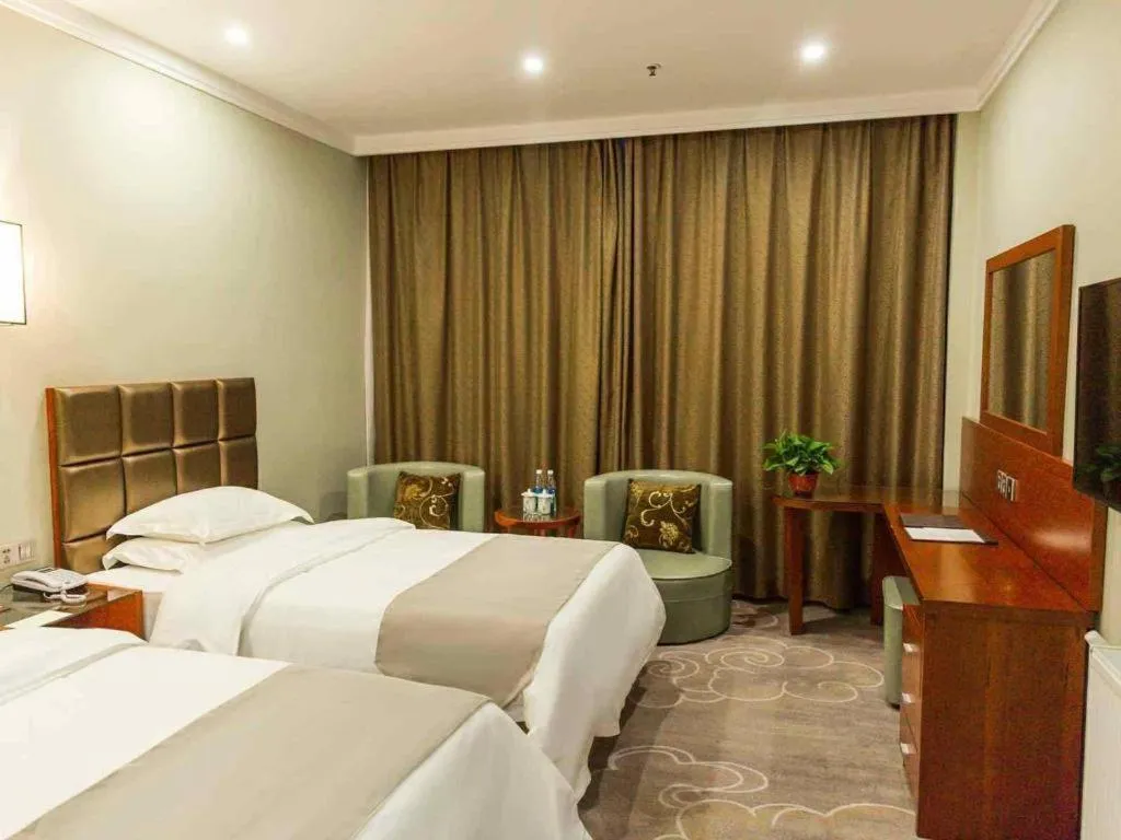 Bed in GreenTree Alliance Hotel Yancheng Engineering College Dayangwan Scenic Area