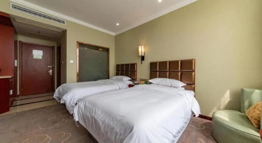 Bed in GreenTree Alliance Hotel Yancheng Engineering College Dayangwan Scenic Area