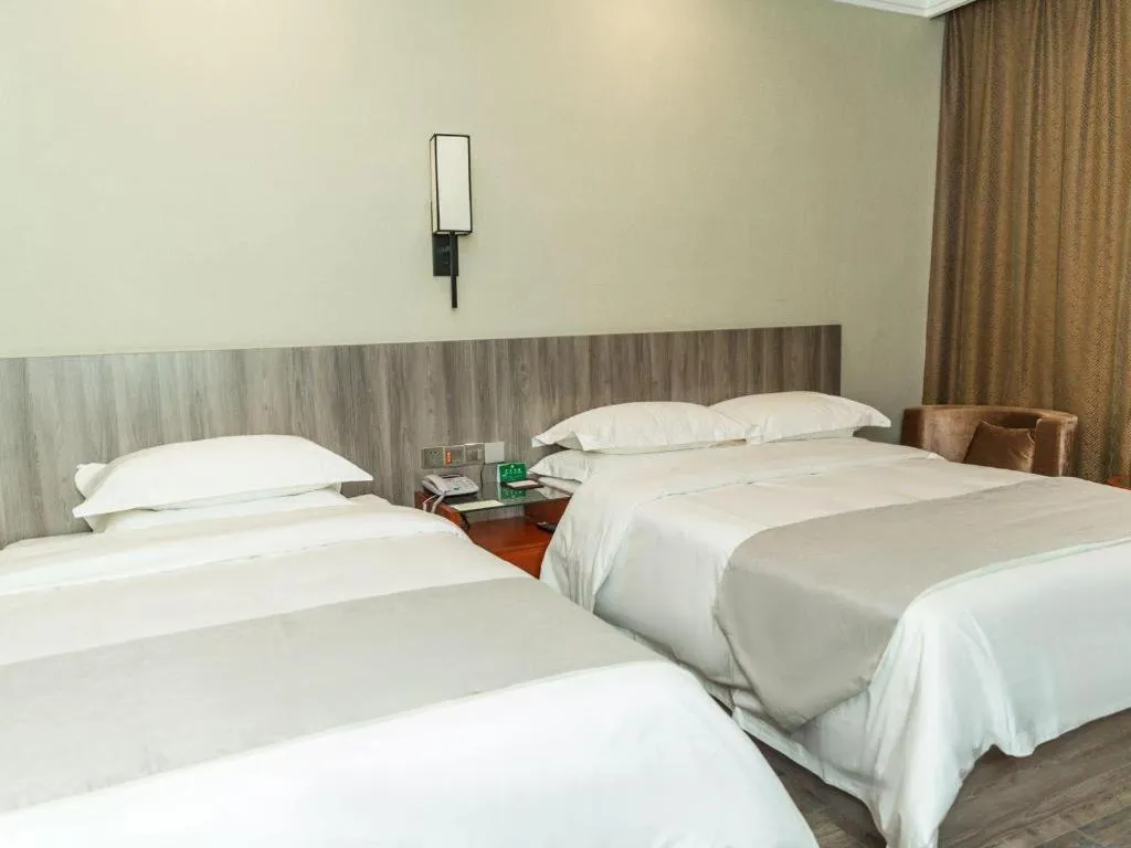 Bed in GreenTree Alliance Hotel Yancheng Engineering College Dayangwan Scenic Area