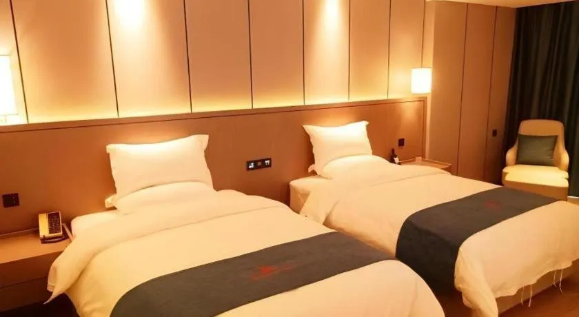 Bed in GreenTree Eastern Hotel Changge Yiwu City