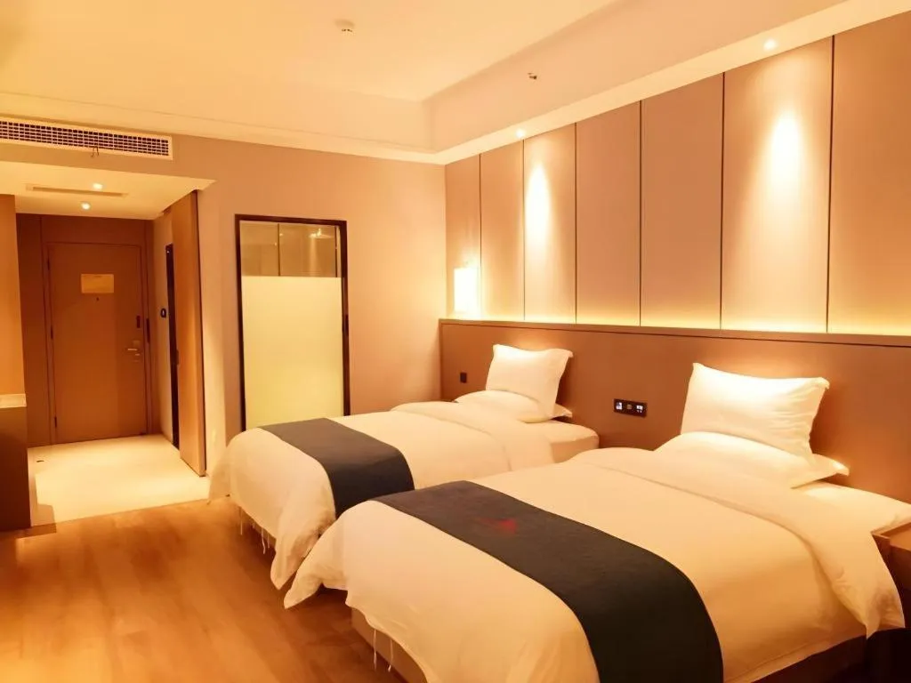 Bed in GreenTree Eastern Hotel Changge Yiwu City