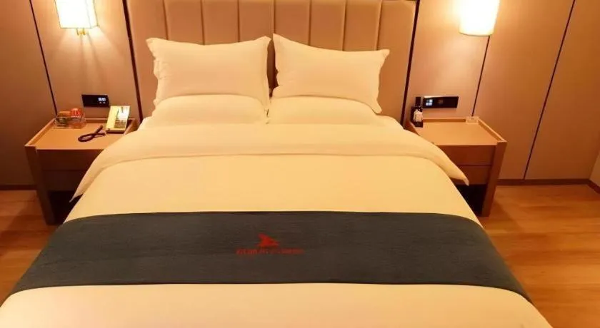Bed in GreenTree Eastern Hotel Changge Yiwu City