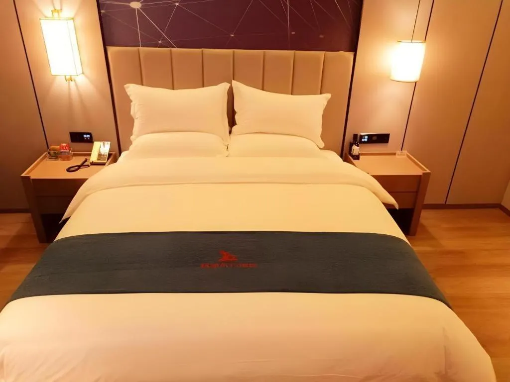 Bed in GreenTree Eastern Hotel Changge Yiwu City