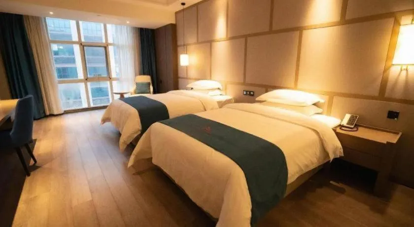 Bed in GreenTree Eastern Hotel Changge Yiwu City