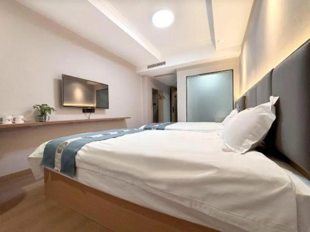 Bed in Shell Hotel Huaibei Jinying Plaza Long Distance Bus Station