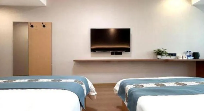 Bed in Shell Hotel Huaibei Jinying Plaza Long Distance Bus Station