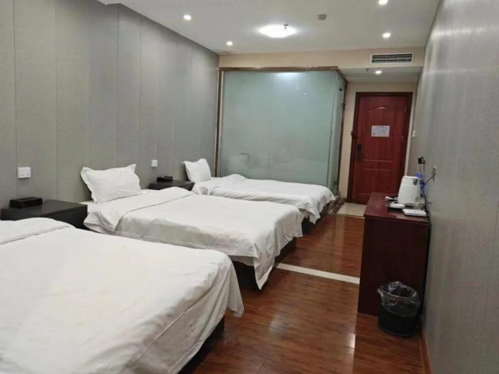 Bed in Shell Hotel Huainan Shou County Passenger Station Yaohai Grand Market