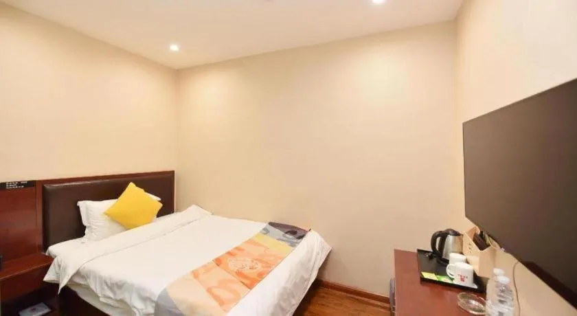 Bed in Shell Hotel Huainan Shou County Passenger Station Yaohai Grand Market