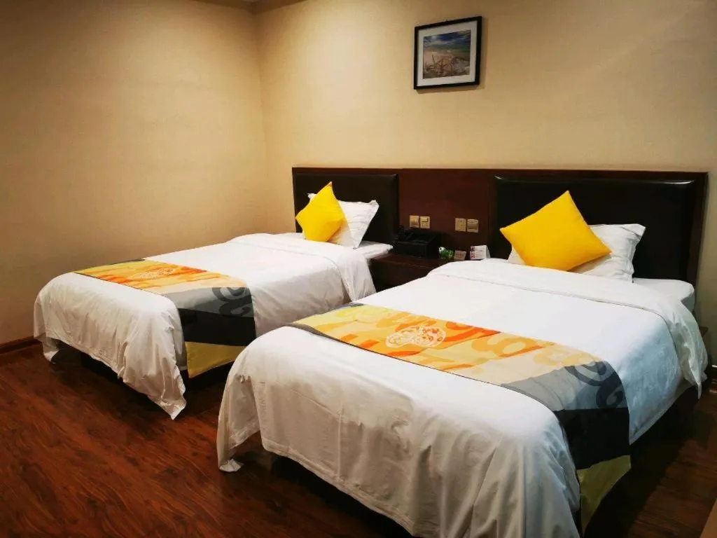 Bed in Shell Hotel Huainan Shou County Passenger Station Yaohai Grand Market