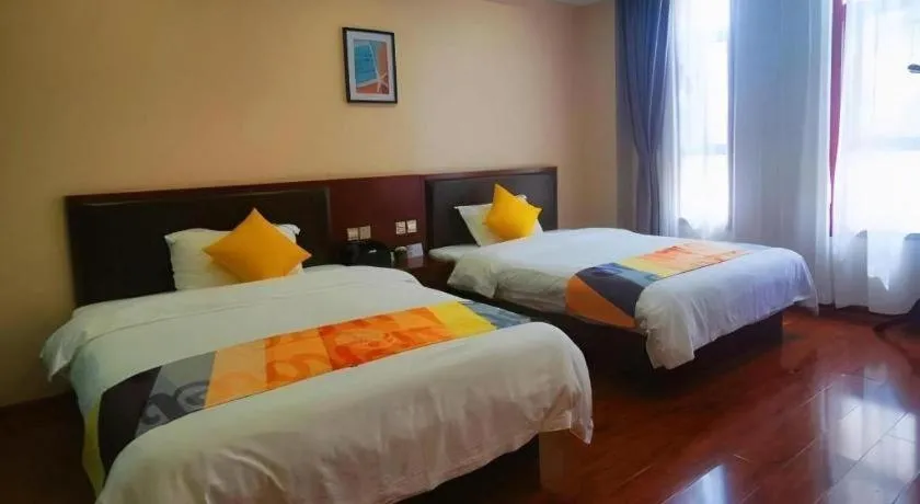 Bed in Shell Hotel Huainan Shou County Passenger Station Yaohai Grand Market