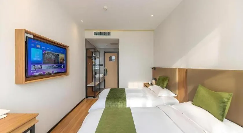 Bed in GreenTree Inn Express Lanzhou West Passenger Station Lanzhou Center