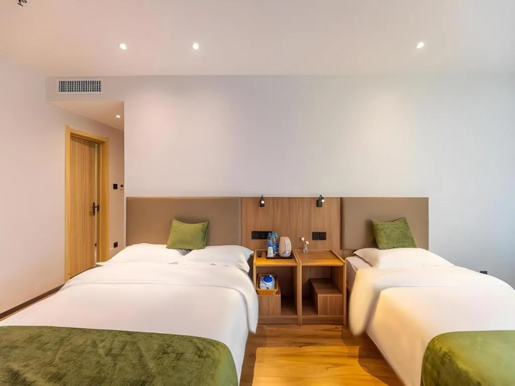 Bed in GreenTree Inn Express Lanzhou West Passenger Station Lanzhou Center