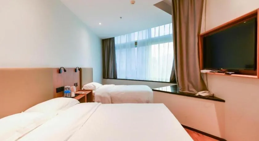 Bed in GreenTree Inn Express Lanzhou West Passenger Station Lanzhou Center