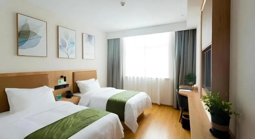 Bed in GreenTree Inn Express Henan Xinyang Huaibin County