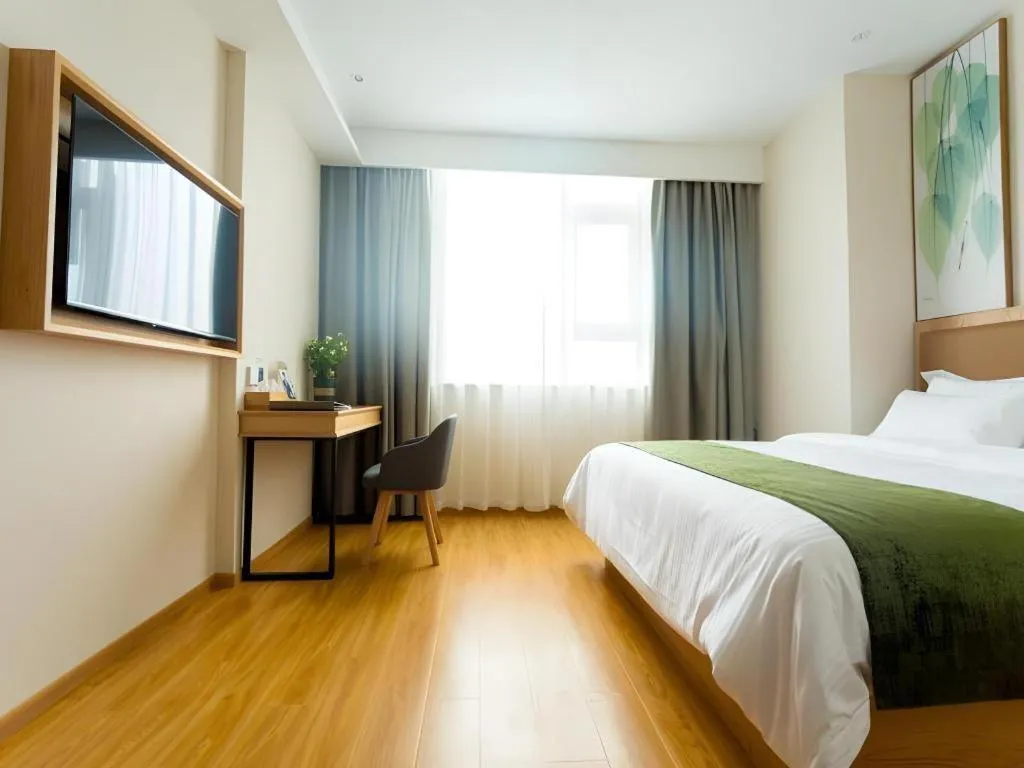 Bed in GreenTree Inn Express Henan Xinyang Huaibin County