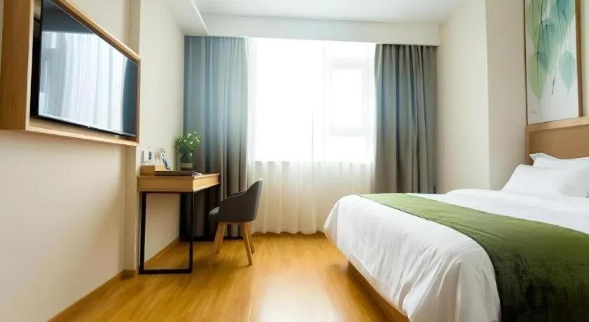 Bed in GreenTree Inn Express Henan Xinyang Huaibin County