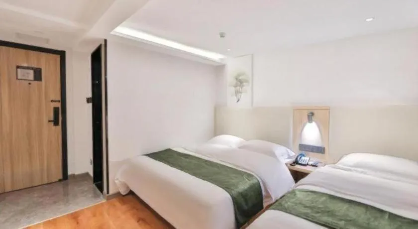 Bed in GreenTree Inn Express Beijing Dongcheng District Beixinqiao Metro Station Gui Street