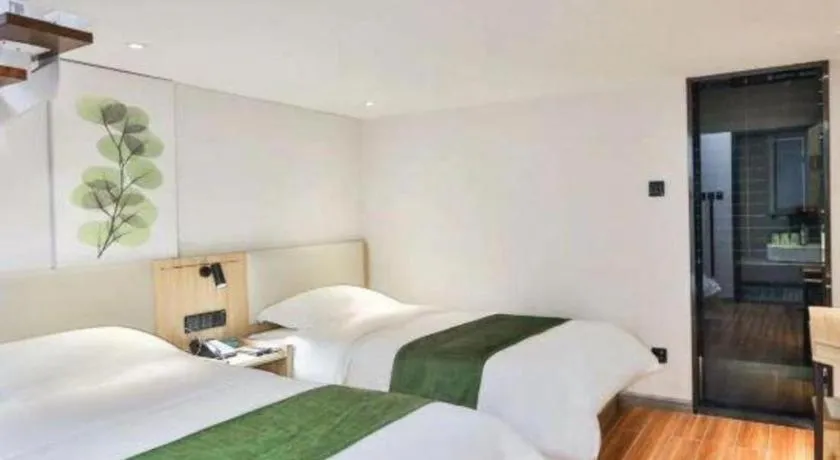Bed in GreenTree Inn Express Beijing Dongcheng District Beixinqiao Metro Station Gui Street