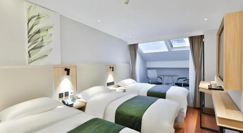 Bed in GreenTree Inn Express Beijing Dongcheng District Beixinqiao Metro Station Gui Street