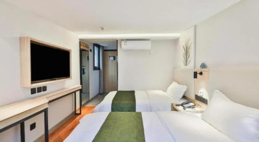Bed in GreenTree Inn Express Beijing Dongcheng District Beixinqiao Metro Station Gui Street