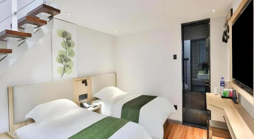 Bed in GreenTree Inn Express Beijing Dongcheng District Beixinqiao Metro Station Gui Street