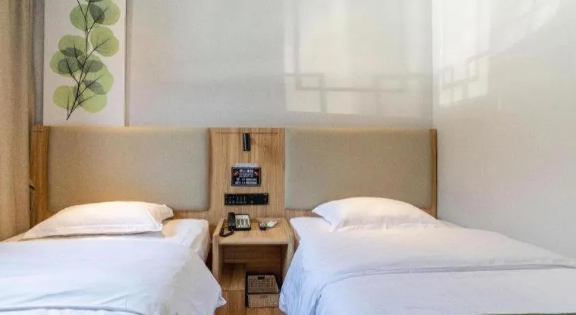 Bed in GreenTree Inn Express Beijing Dongcheng District Beixinqiao Metro Station Gui Street