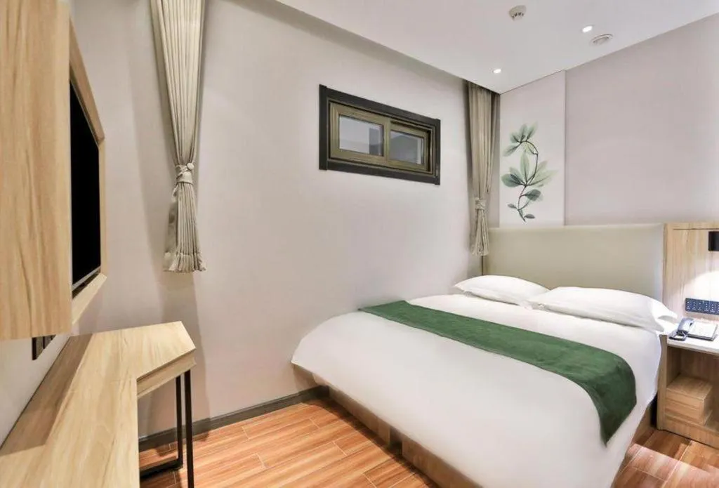 Bed in GreenTree Inn Express Beijing Dongcheng District Beixinqiao Metro Station Gui Street
